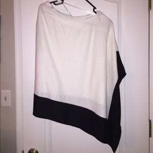 Black and white asymmetrical cape. Never been worn